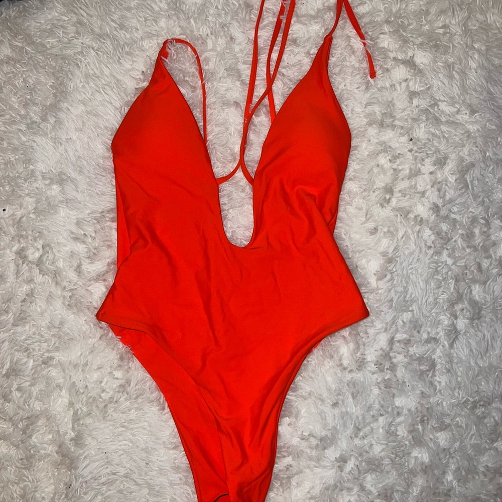 Shein Orange One Piece Bathing Suit. Never worn. Size small.